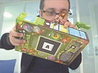 Le paquet de céréales se transforme en console de jeu vidéo et permet d'accéder à un monde en 3D.
