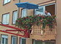 Immobilien Scout 24 communique de façon décalée avec un balcon